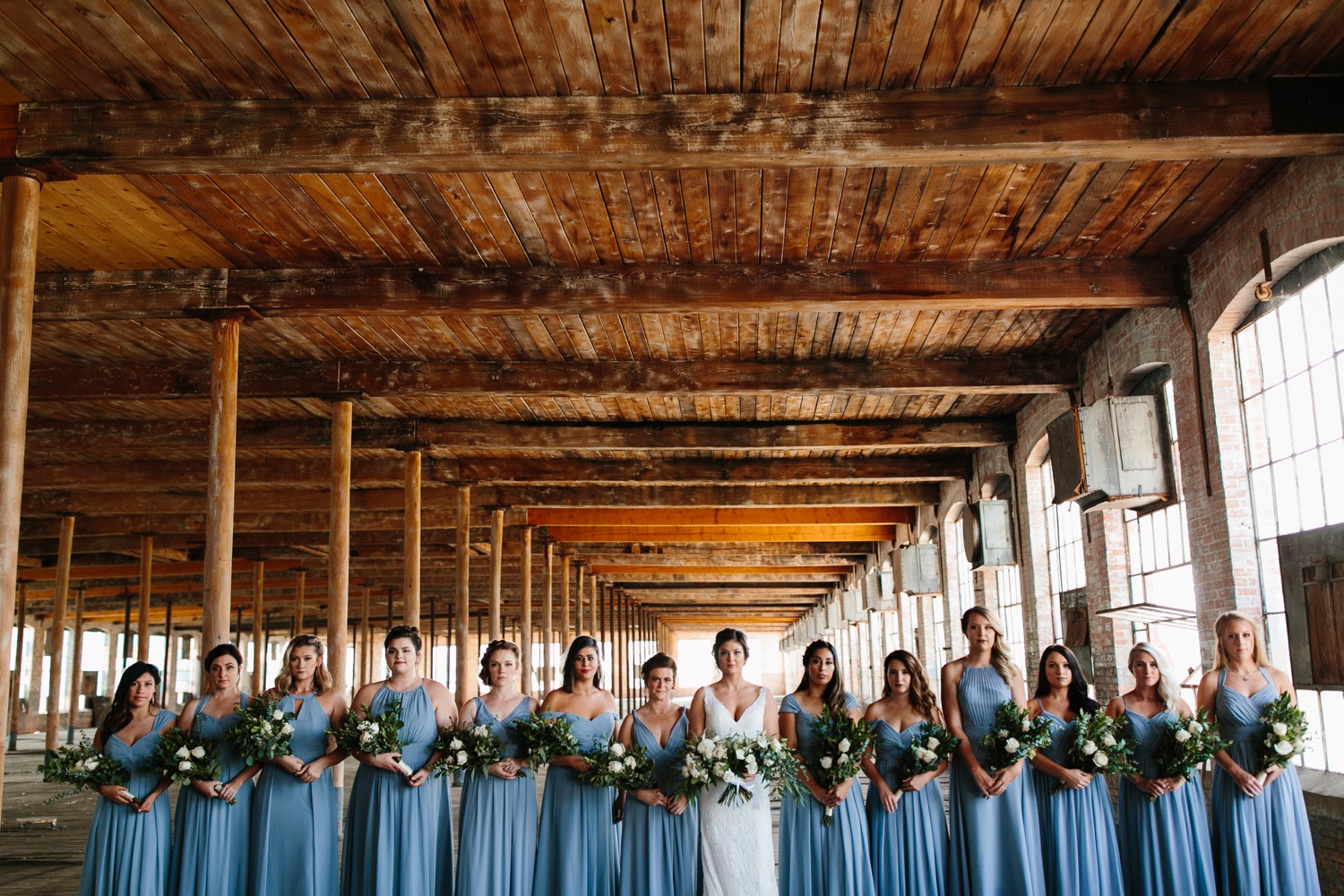 Virginia + Kory | emotional, industrial style wedding with dusty blue, ivory, and gold accents at the Mckinney Cotton Mill by North Texas Wedding Photographer Rachel Meagan Photography | 015