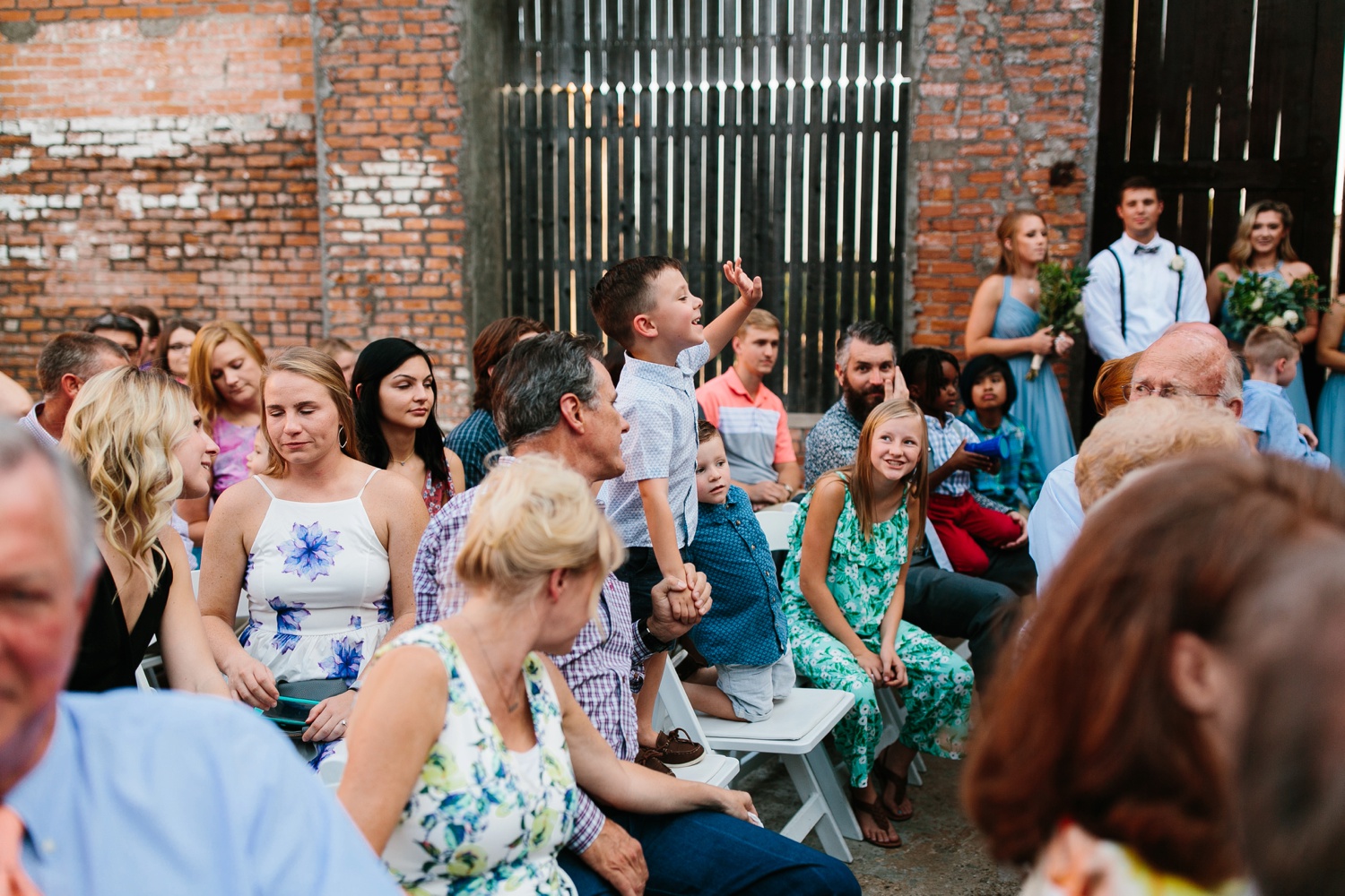 Virginia + Kory | emotional, industrial style wedding with dusty blue, ivory, and gold accents at the Mckinney Cotton Mill by North Texas Wedding Photographer Rachel Meagan Photography | 039