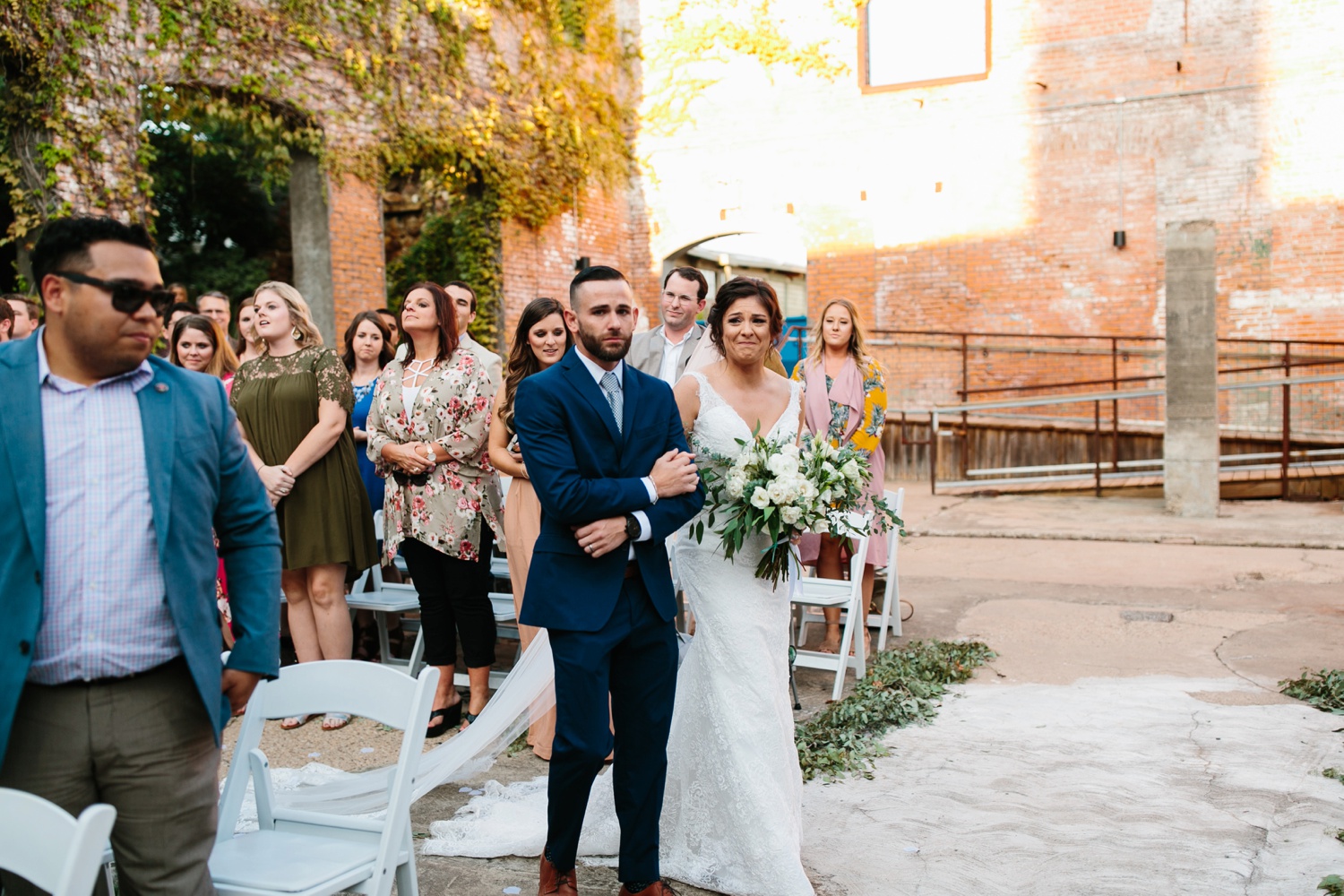 Virginia + Kory | emotional, industrial style wedding with dusty blue, ivory, and gold accents at the Mckinney Cotton Mill by North Texas Wedding Photographer Rachel Meagan Photography | 044