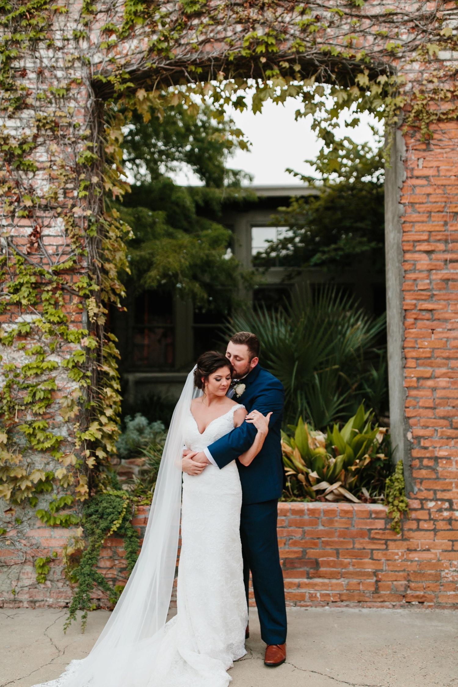 Virginia + Kory | emotional, industrial style wedding with dusty blue, ivory, and gold accents at the Mckinney Cotton Mill by North Texas Wedding Photographer Rachel Meagan Photography | 088