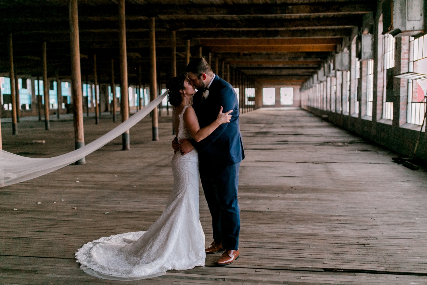 Virginia + Kory | emotional, industrial style wedding with dusty blue, ivory, and gold accents at the Mckinney Cotton Mill by North Texas Wedding Photographer Rachel Meagan Photography | 093