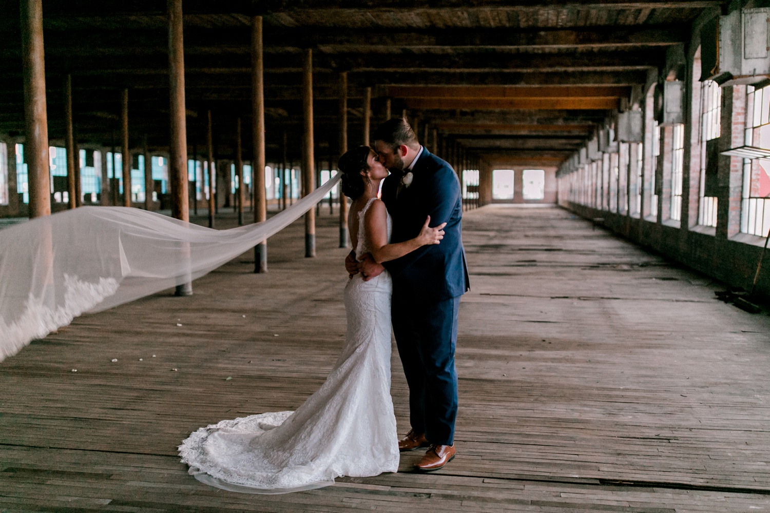 Virginia + Kory | emotional, industrial style wedding with dusty blue, ivory, and gold accents at the Mckinney Cotton Mill by North Texas Wedding Photographer Rachel Meagan Photography | 094