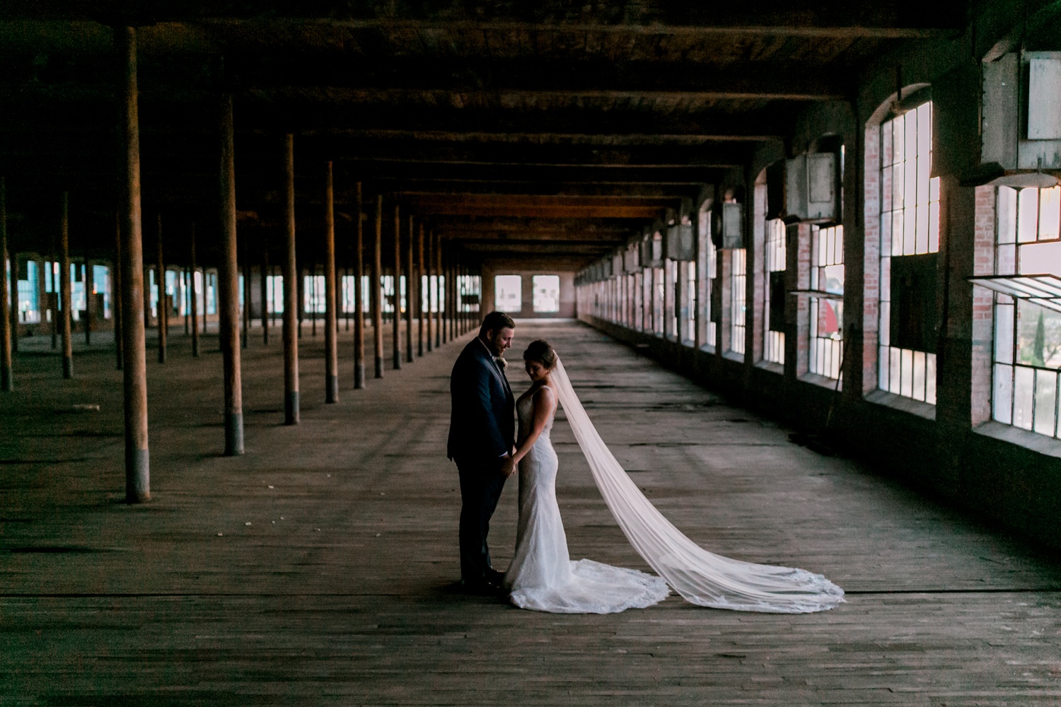 Virginia + Kory | emotional, industrial style wedding with dusty blue, ivory, and gold accents at the Mckinney Cotton Mill by North Texas Wedding Photographer Rachel Meagan Photography | 099