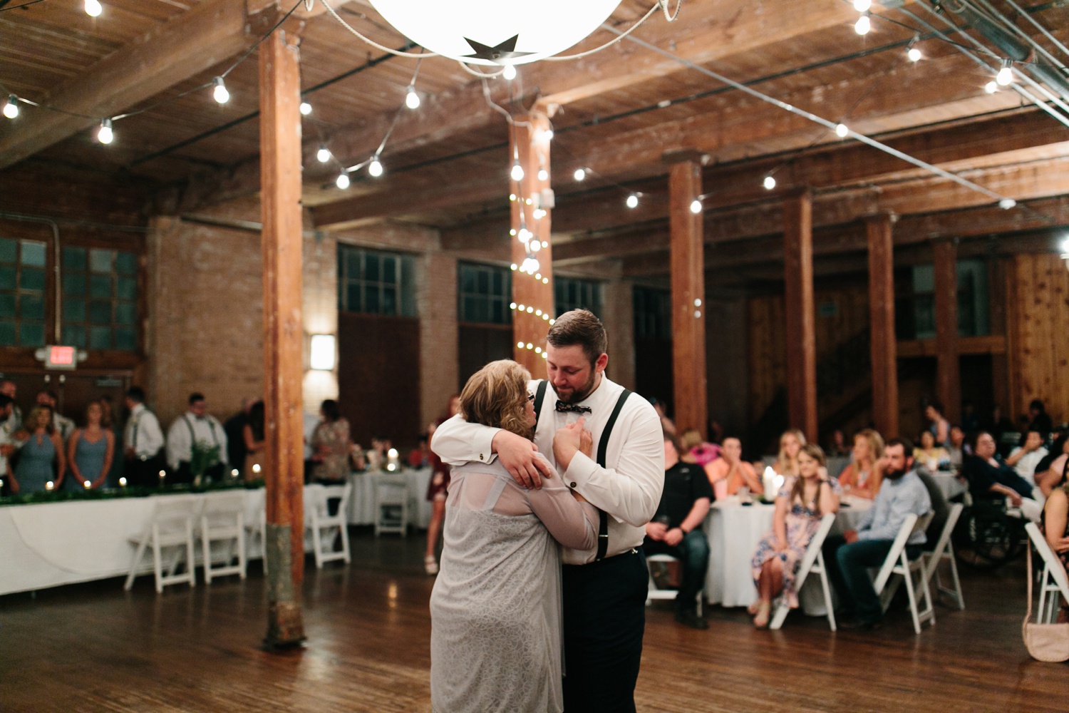 Virginia + Kory | emotional, industrial style wedding with dusty blue, ivory, and gold accents at the Mckinney Cotton Mill by North Texas Wedding Photographer Rachel Meagan Photography | 108