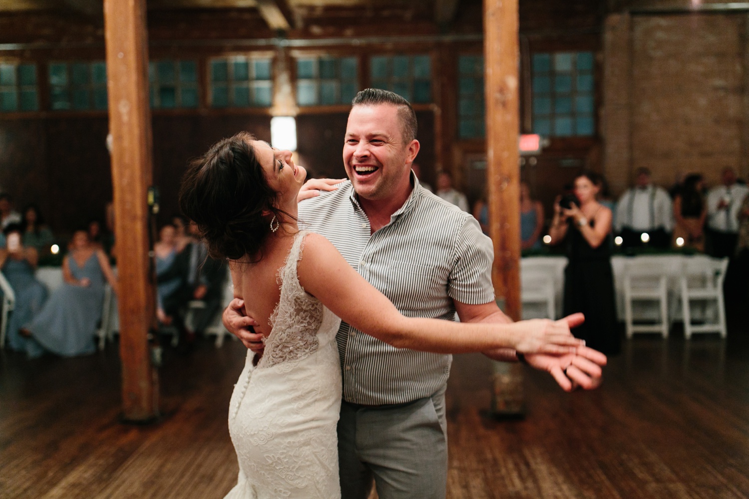 Virginia + Kory | emotional, industrial style wedding with dusty blue, ivory, and gold accents at the Mckinney Cotton Mill by North Texas Wedding Photographer Rachel Meagan Photography | 116