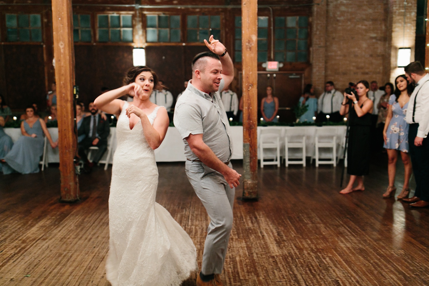 Virginia + Kory | emotional, industrial style wedding with dusty blue, ivory, and gold accents at the Mckinney Cotton Mill by North Texas Wedding Photographer Rachel Meagan Photography | 117