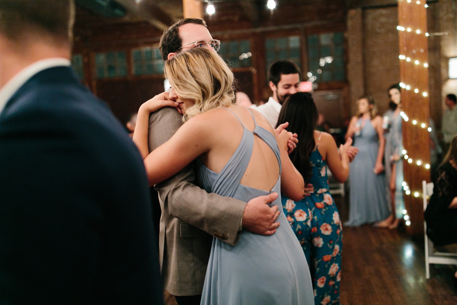 Virginia + Kory | emotional, industrial style wedding with dusty blue, ivory, and gold accents at the Mckinney Cotton Mill by North Texas Wedding Photographer Rachel Meagan Photography | 125