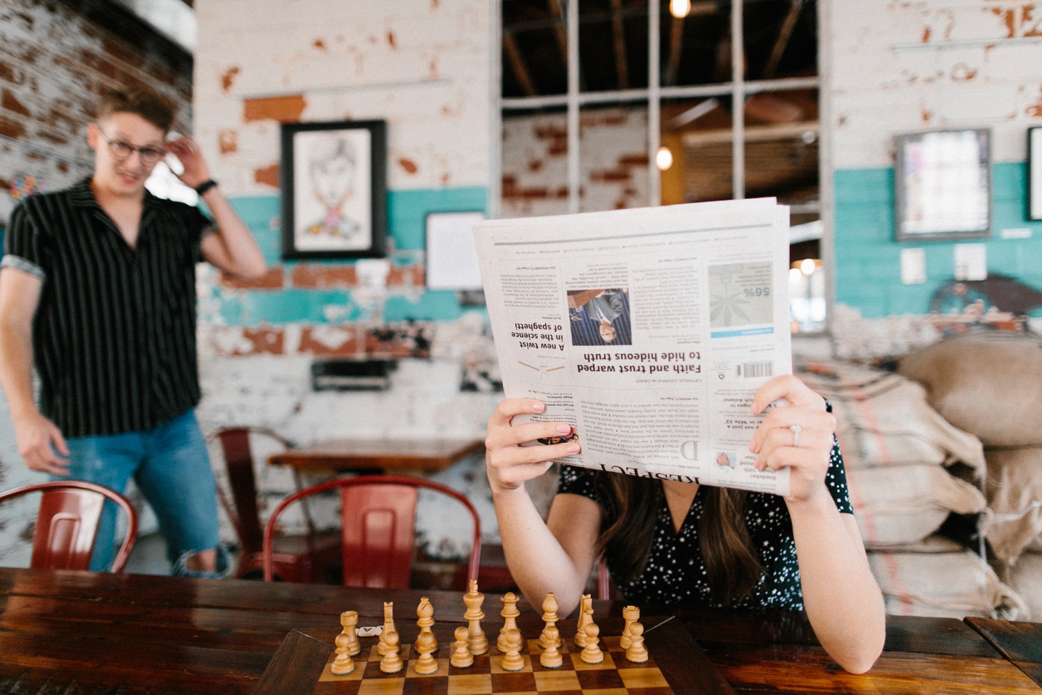 Annie + Max | cozy coffee shop, dowtown Fort Smith, Hawksbill Crag stylish engagement session in the Ozark National Forest by Destination Wedding Photographer Rachel Meagan Photography | 001