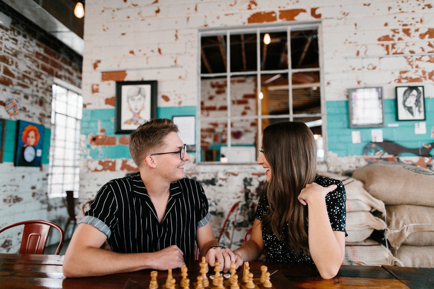 Annie + Max | cozy coffee shop, dowtown Fort Smith, Hawksbill Crag stylish engagement session in the Ozark National Forest by Destination Wedding Photographer Rachel Meagan Photography | 002