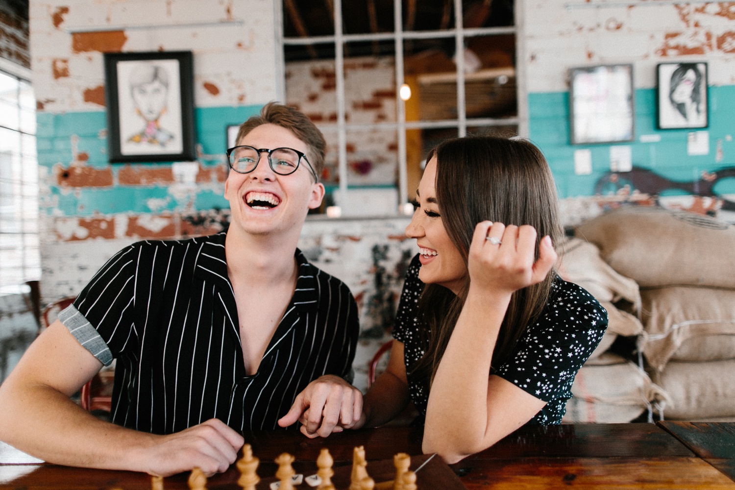 Annie + Max | cozy coffee shop, dowtown Fort Smith, Hawksbill Crag stylish engagement session in the Ozark National Forest by Destination Wedding Photographer Rachel Meagan Photography | 005