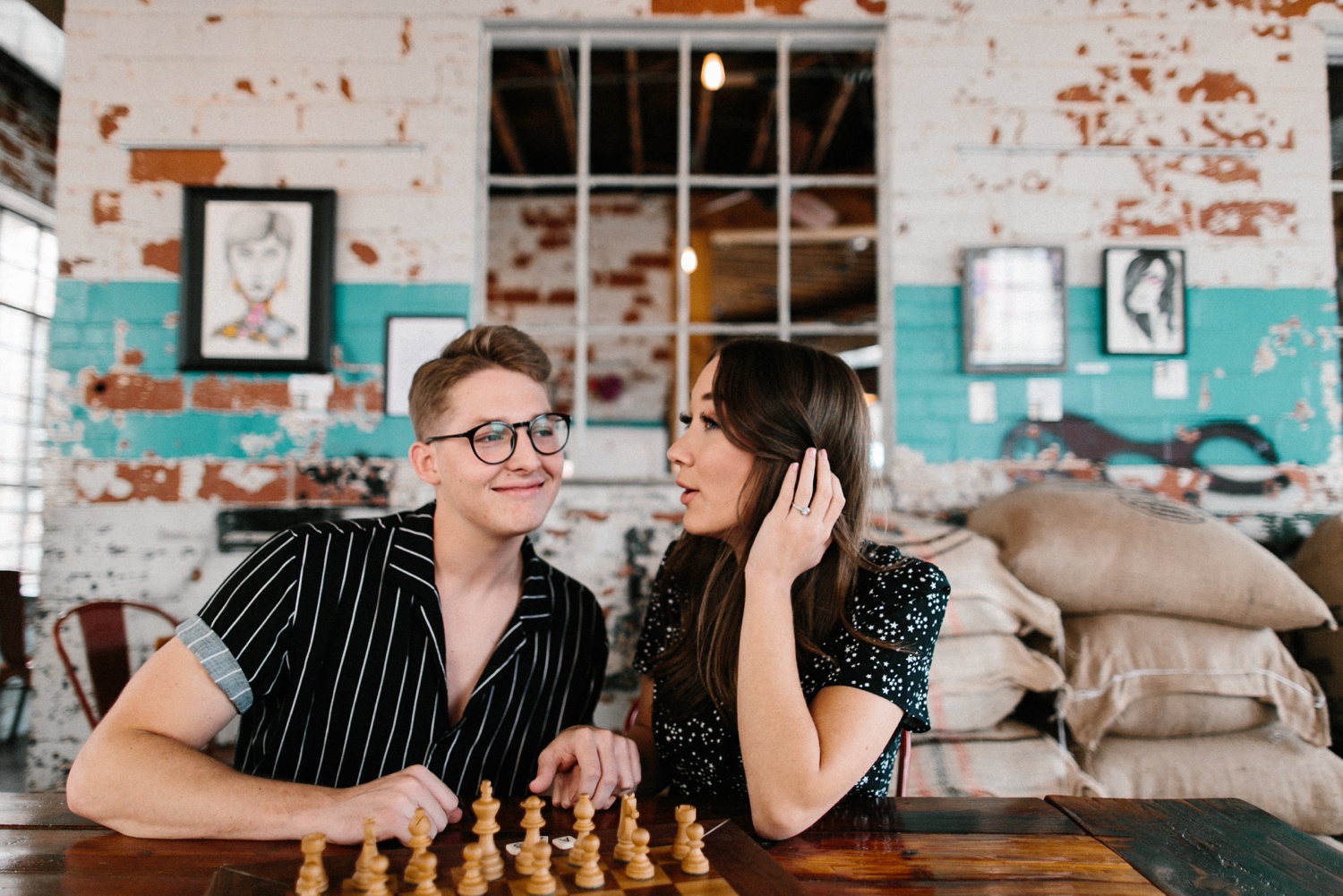 Annie + Max | cozy coffee shop, dowtown Fort Smith, Hawksbill Crag stylish engagement session in the Ozark National Forest by Destination Wedding Photographer Rachel Meagan Photography | 006
